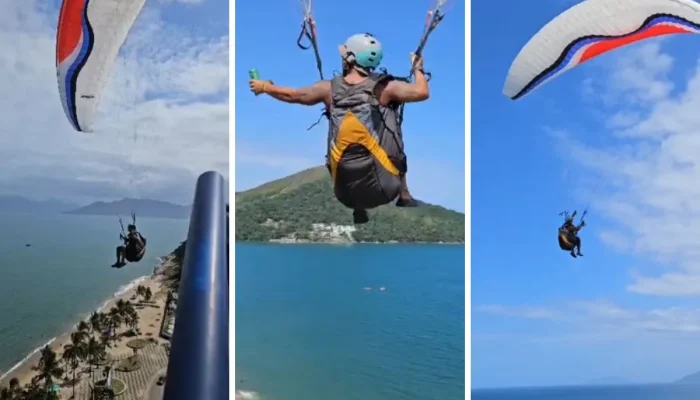 Piloto de parapente surpreende ao pegar cerveja em cobertura de prédio em Caraguatatuba, Litoral de SP